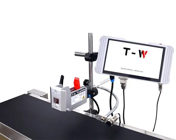 T-W — panel sterujący i głowica na wsporniku przy przenośniku
